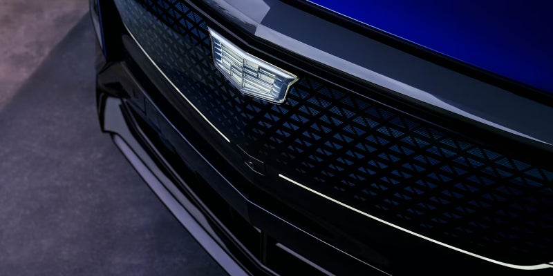 A logo of Cadillac on blue 2025 Cadillac Lyriq