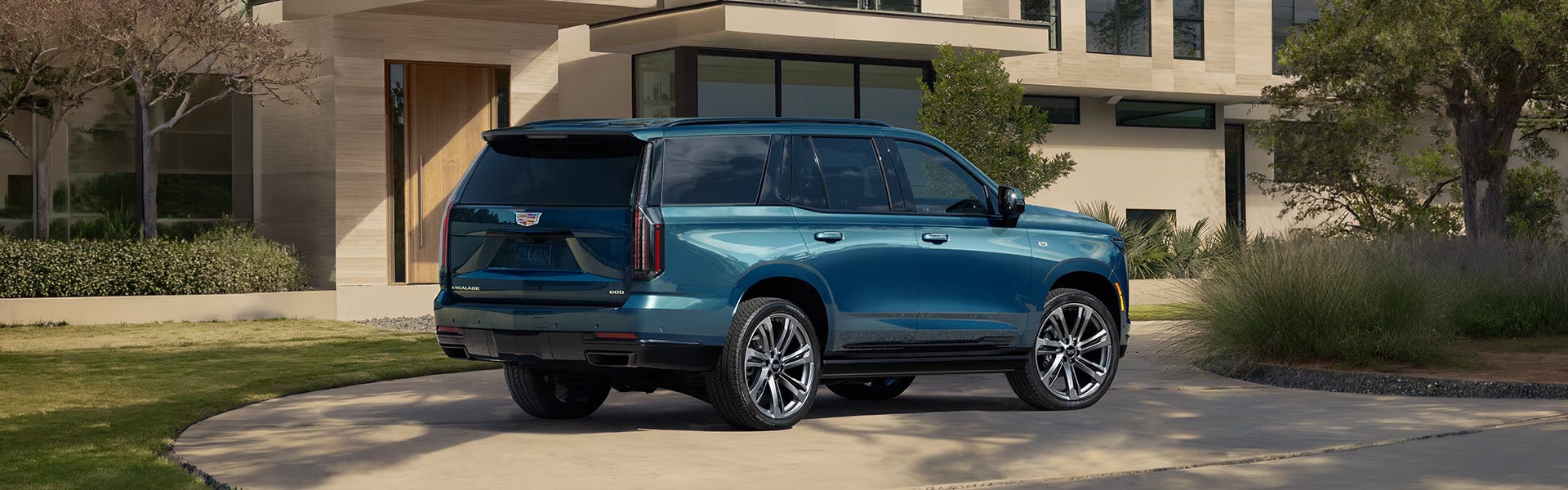 2026 Cadillac Escalade in blue, showcasing premium design.