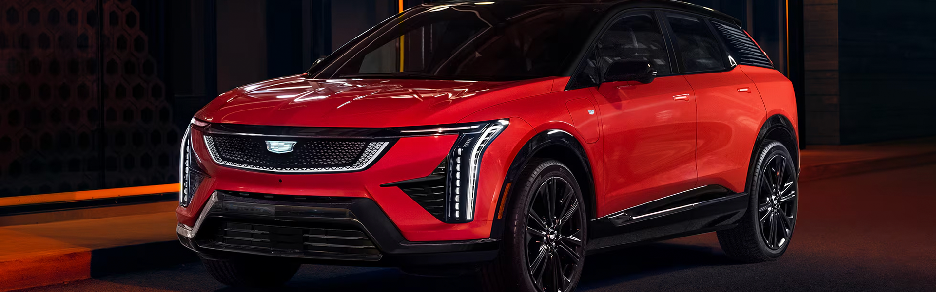 Red 2027 Cadillac Optiq electric SUV.
