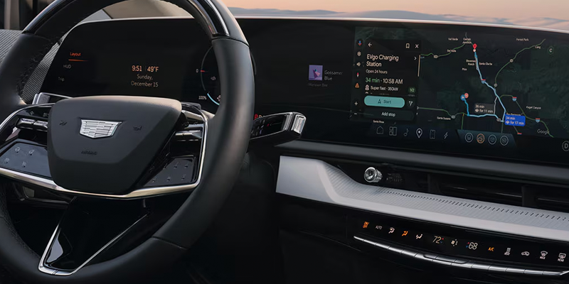 Cadillac Optiq interior with digital dashboard and infotainment display.
