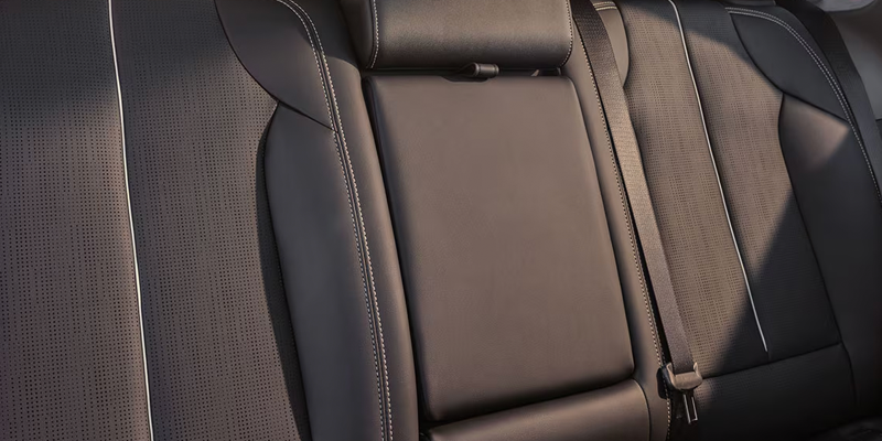 Close-up of Cadillac Optiq rear seat upholstery.